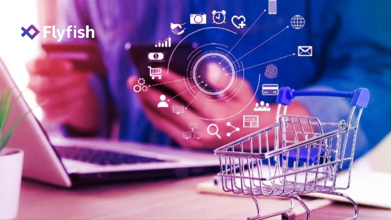 Digital icons swirl around a mini cart with a laptop.